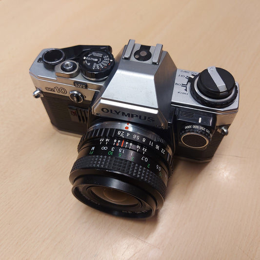 Olympus OM-10 + 28mm f/2.8 Miranda +manual adapter